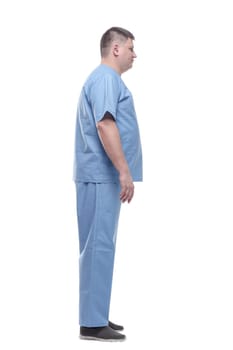 side view. a male medic in a blue uniform . isolated on a white background.