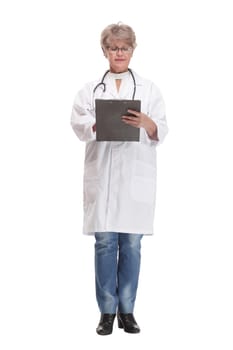 Front view of female doctor wearing stethoscope and glasses looking at an x-ray. Concept of medical help