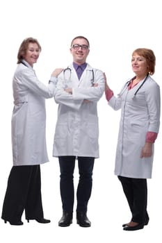 Attractive male doctor istanding in front of medical group smiling at camera together
