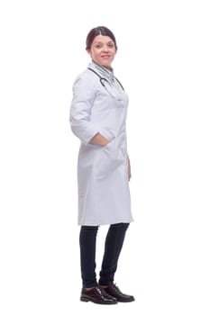 Portrait of an attractive young female doctor or nurse with stethoscope in white uniform standing with palms up presenting something
