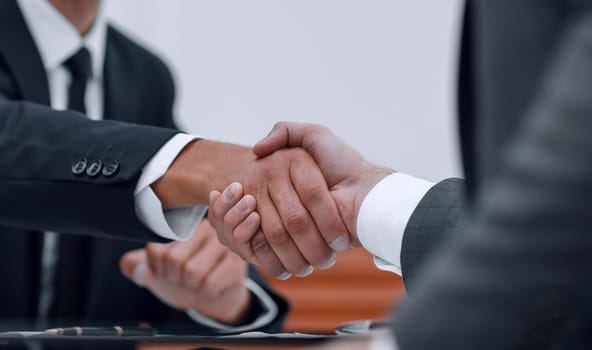 handshake Manager and the client sitting in the office.the concept of trust.