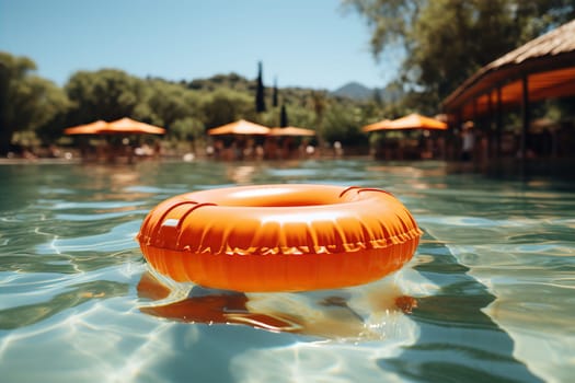 Orange lifebuoy on water in swimming pool closeup. Help for drowning people. AI generated