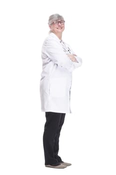 in full growth. smiling woman doctor reading an ad on a white screen. isolated on a white background.