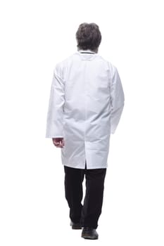 rear view. confident male doctor rushes to the call. isolated on a white background