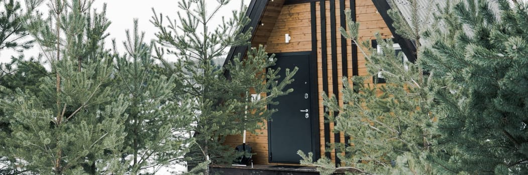 A country house in nature in winter. Rest in an ecologically clean place in winter. Glamping in nature