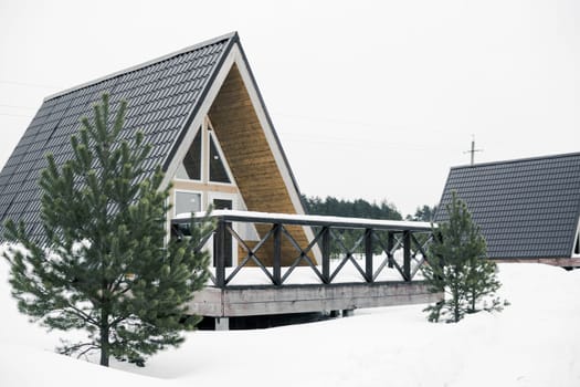 A country house in nature in winter. Rest in an ecologically clean place in winter. Glamping in nature
