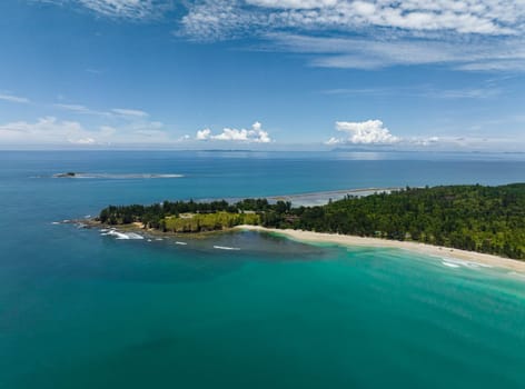 Aerial drone of sandy beach and turquoise water of the tropical sea. Kalampunian beach. Sabah, Borneo, Malaysia.