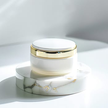 Face cream in a glass jar on a white and gold background. Skin care concept. Backdrop for beauty cosmetic products