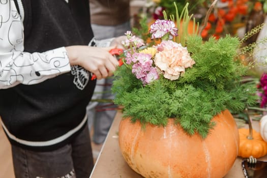 Creating a floral composition in a pumpkin. Making decor with your own hands