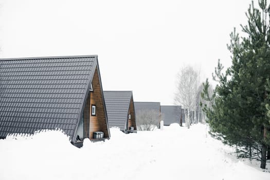 A country house in nature in winter. Rest in an ecologically clean place in winter. Glamping in nature