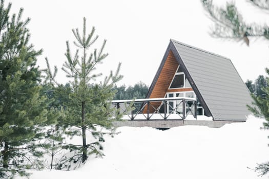 A country house in nature in winter. Rest in an ecologically clean place in winter. Glamping in nature