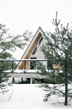 A country house in nature in winter. Rest in an ecologically clean place in winter. Glamping in nature