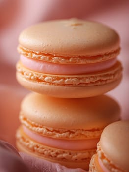 Delicious pink macarons delicately stacked, showcasing elegant French baking and sweet confection
