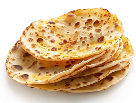 Stack of delicious golden crispy homemade flatbread naan with texture perfect for breakfast