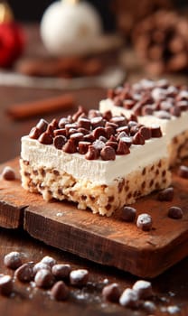 Delicious dessert with chocolate chips, creamy frosting, and a tasty pastry garnished beautifully