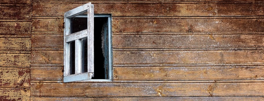 Brown wall open window background image. Old house. Vitage, wood trim of an old house.