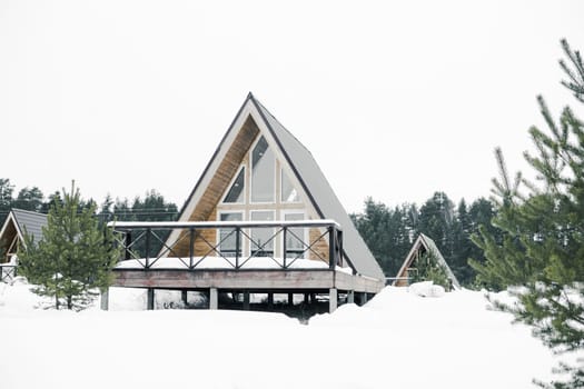 A country house in nature in winter. Rest in an ecologically clean place in winter. Glamping in nature