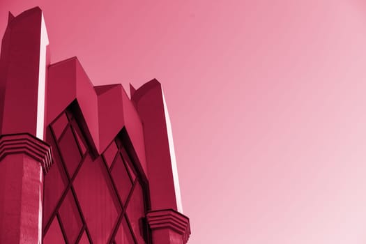 Glass modern building, skyscrapers. A simple architectural form against the sky.Fragments of modern urban architecture.