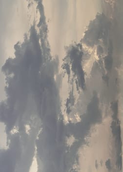 The sky is being covered with amazing clouds. Beautiful clouds like a heaven sky toward the light, Concept idea of Imaginative clouds nature, Nature abstract composition for background wallpaper and textures, Space for text, Selective focus.