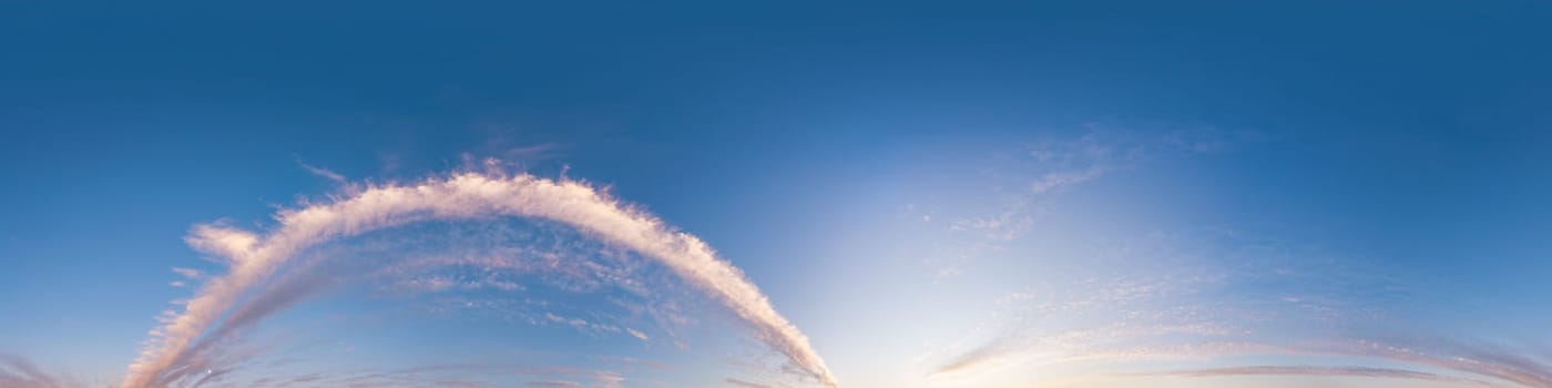 Bright sunset sky panorama with Cirrus clouds. Seamless hdr spherical equirectangular 360 panorama. Sky dome or zenith for 3D visualization, game and sky replacement for aerial drone 360 panoramas.