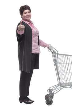 side view. a female customer with an empty shopping cart . isolated on a white background