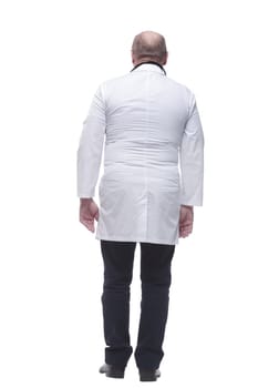 rear view. doctor-therapist reading an ad on a white screen. isolated on a white background