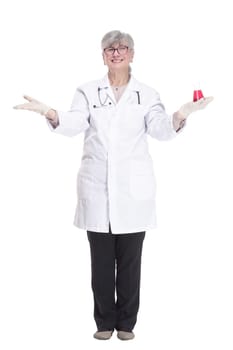 in full growth. a smiling medical woman with a laboratory flask in her hands. isolated on a white background.