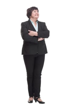in full growth.Mature business woman in a pantsuit . isolated on a white background.
