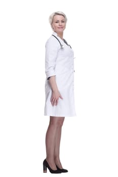 in full growth. young woman doctor looking at you . isolated on a white background.