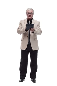 in full growth. Mature intelligent man with a calculator. isolated on a white background.