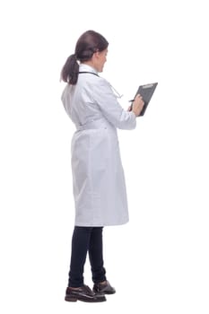 Back view female doctor with stethoscope and clipboard. Healthcare and medicine concept