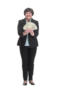 Mature business woman with a bundle of banknotes . isolated on a white background.