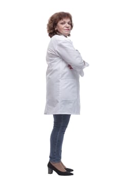 side view. confident woman doctor looking at a white screen. isolated on a white background