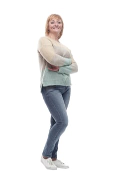 casual smiling woman in jeans and a white jumper. isolated on a white background.