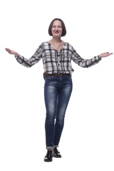 in full growth. friendly mature woman in jeans welcomes you . isolated on a white background.
