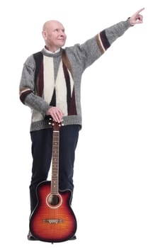 full-length. mature man with guitar in hand looking at you. isolated on a white background.