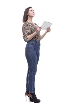 in full growth. attractive young woman with a digital tablet. isolated on a white background.
