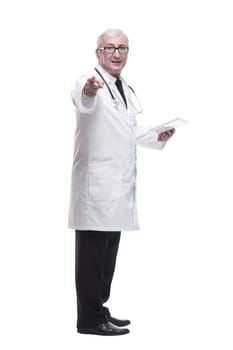 in full growth.qualified mature doctor with digital tablet . isolated on a white background.