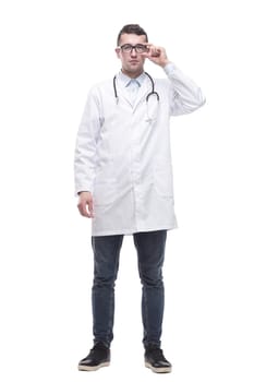 in full growth. a successful male doctor with a stethoscope . isolated on a white background.