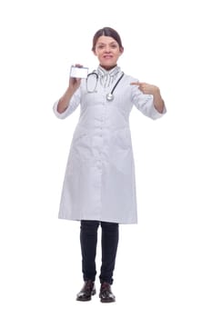 Portrait of happy smiling young female doctor showing blank business card or invitation, over white background