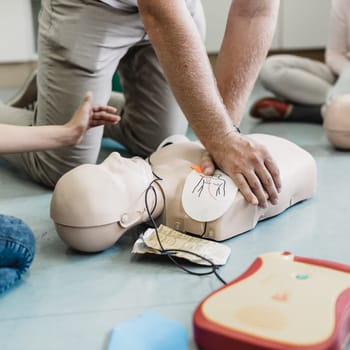 First aid cardiopulmonary resuscitation course using automated external defibrillator device, AED.