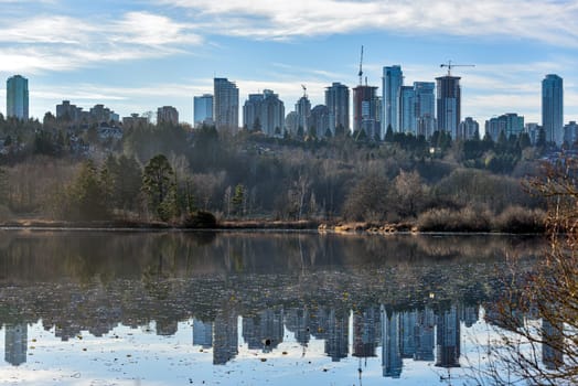 View at Metrotown high-rise buildings from Deer lake shore