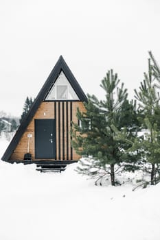 A country house in nature in winter. Rest in an ecologically clean place in winter. Glamping in nature