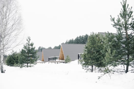 A country house in nature in winter. Rest in an ecologically clean place in winter. Glamping in nature