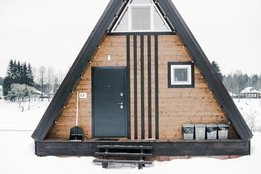 A country house in nature in winter. Rest in an ecologically clean place in winter. Glamping in nature