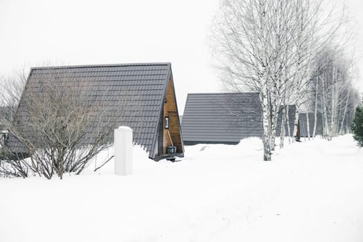 A country house in nature in winter. Rest in an ecologically clean place in winter. Glamping in nature