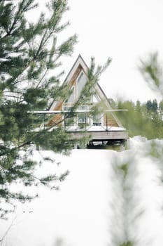 A country house in nature in winter. Rest in an ecologically clean place in winter. Glamping in nature