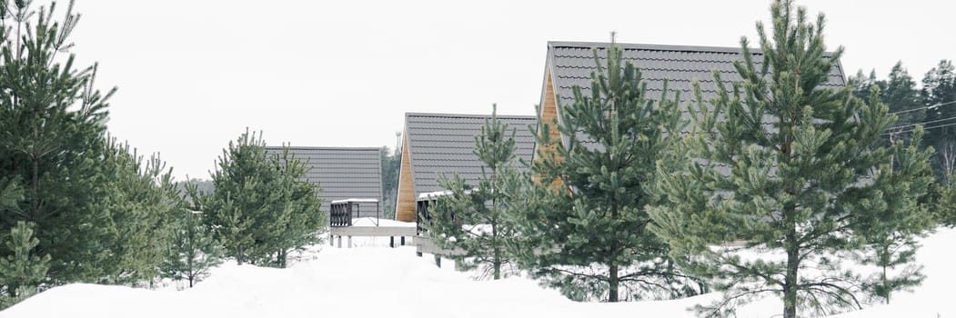 A country house in nature in winter. Rest in an ecologically clean place in winter. Glamping in nature