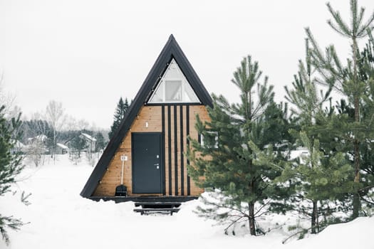 A country house in nature in winter. Rest in an ecologically clean place in winter. Glamping in nature