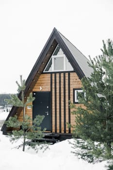 A country house in nature in winter. Rest in an ecologically clean place in winter. Glamping in nature